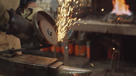 Blacksmith-Working-with-Cutting-Wheel